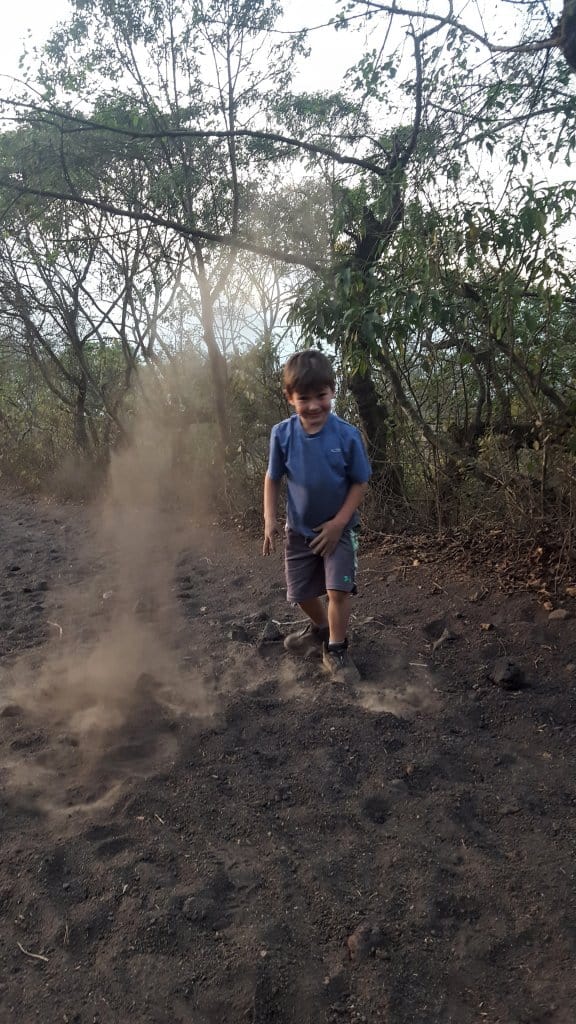 Eli playing in the dirt on the way down