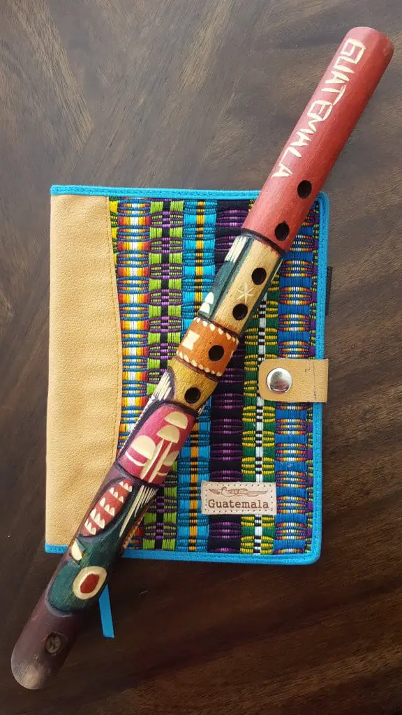 Eli's flute and notebook from the market in Antigua