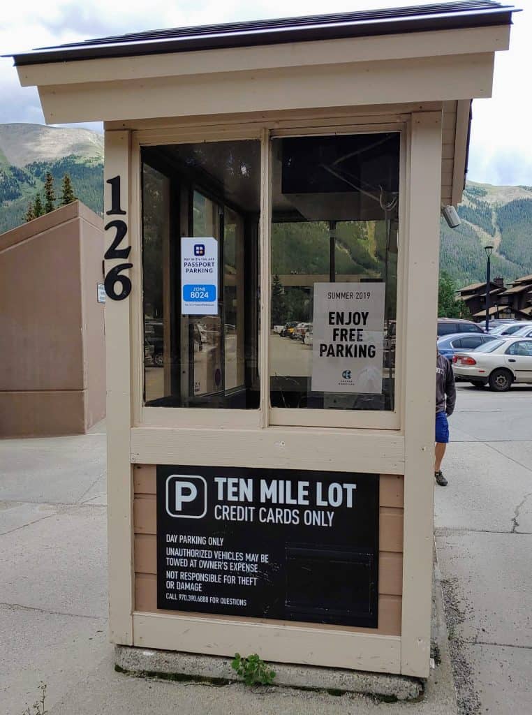Ten Mile Lot at Copper Mountain with a sign about free parking in the summer