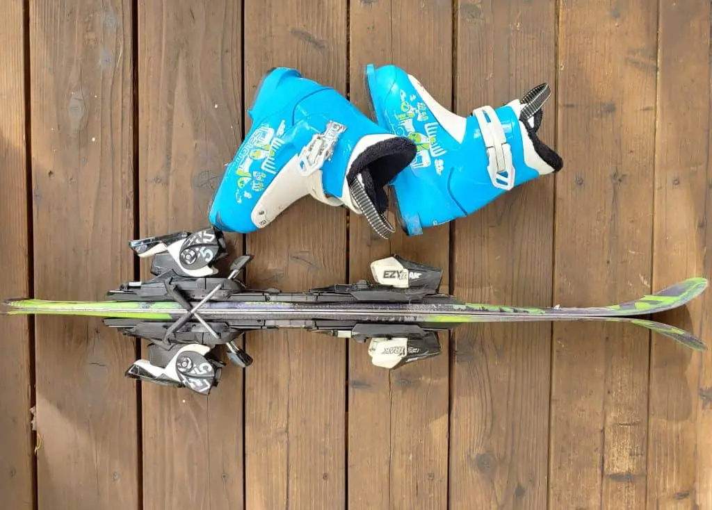 one pair of kid's size skis and ski boots
