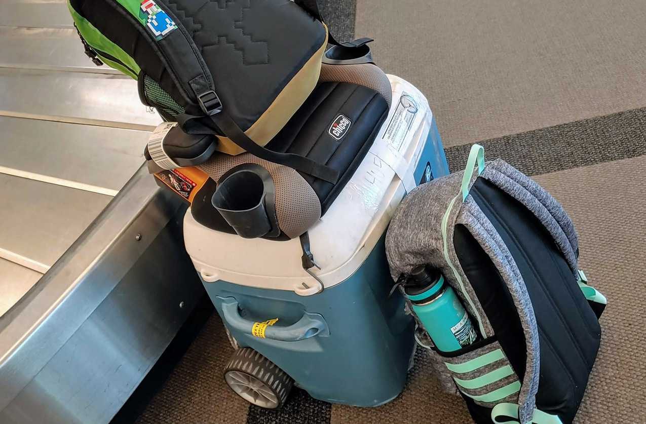 Why a Wheeled Cooler Makes a Great Checked Bag - Travels With Eli