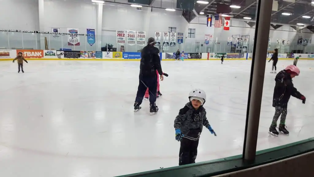 Child ice skating in Breckenridge at the Stephen C West Ice Arena