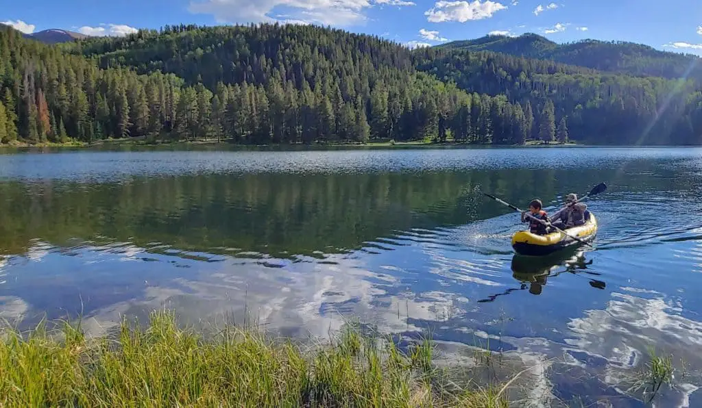Father and Son kayaking on Sylvan Lake State Park Colorado