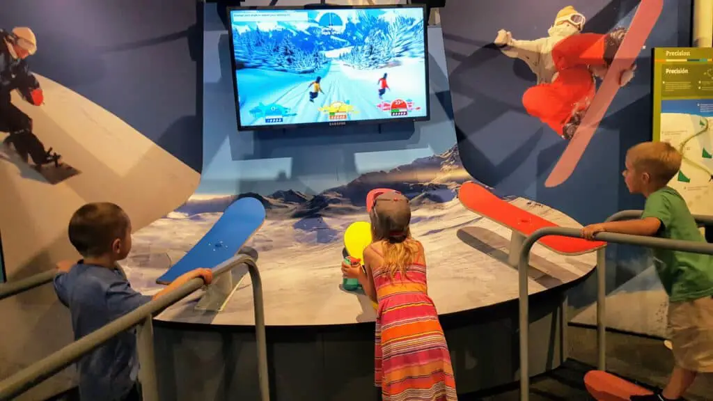 Kids playing a virtual game at the Springs Preserve - the perfect place to take kids in Las Vegas