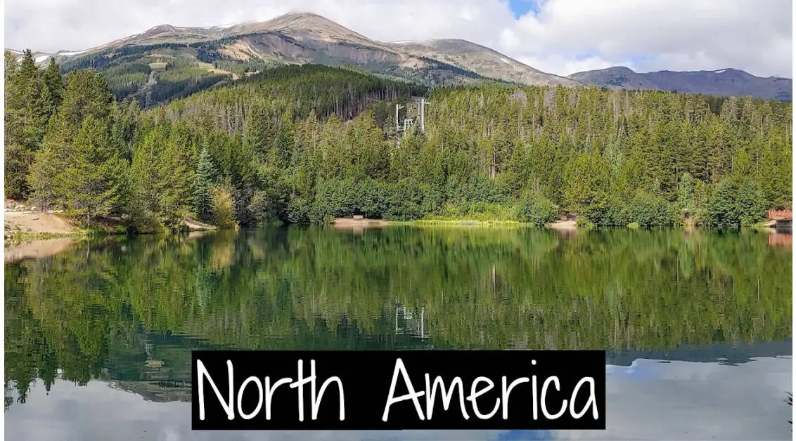 Lake with mountains in the background text - North America